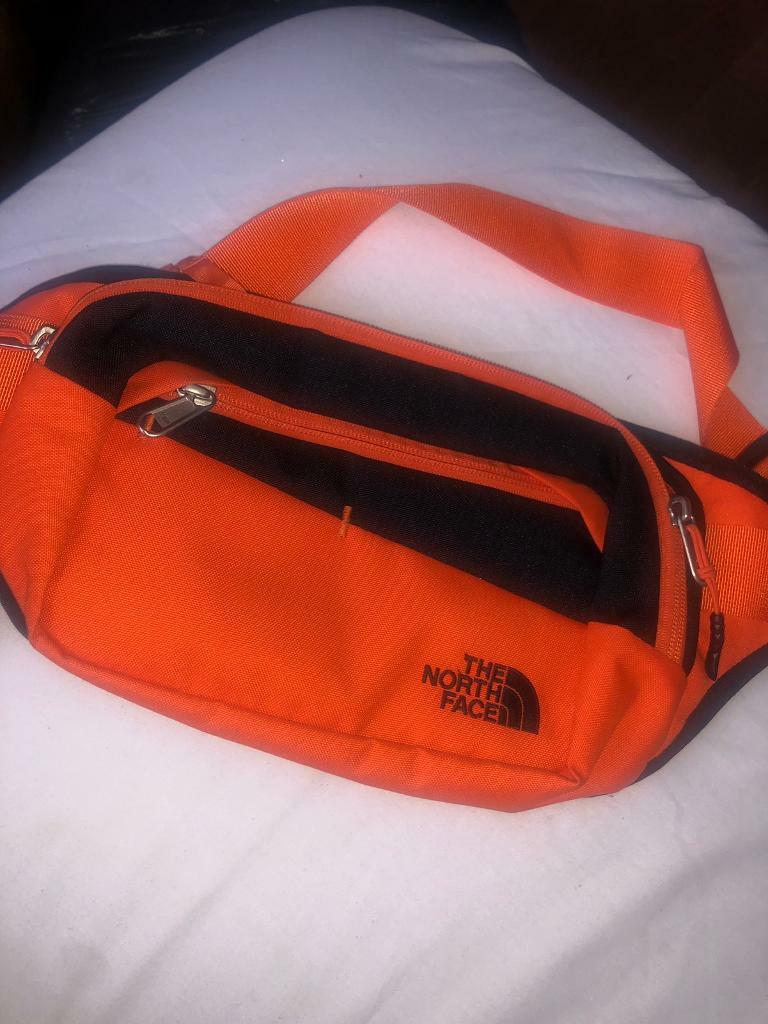 orange north face bum bag
